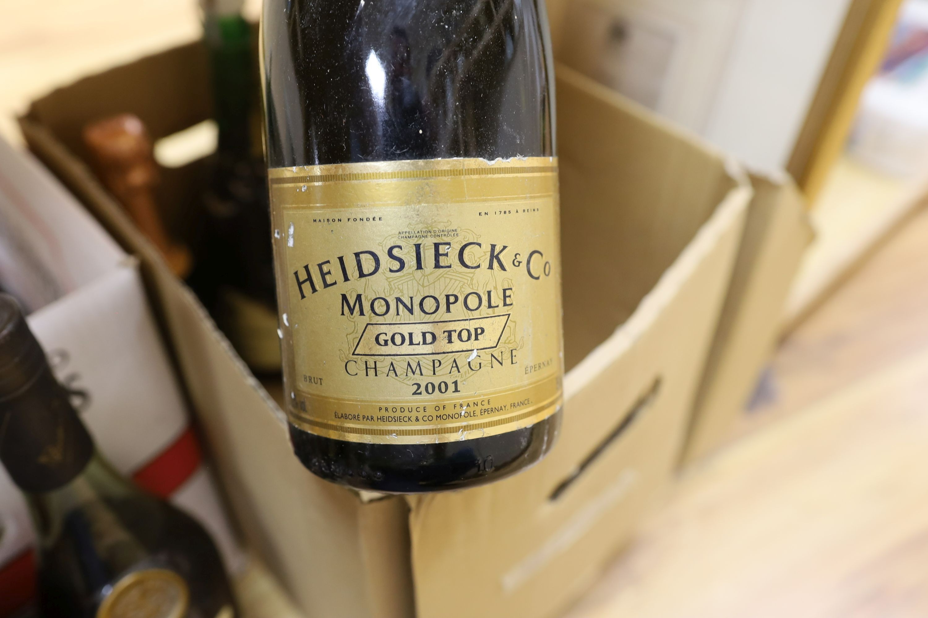 A group of wines and champagnes including Chateau La Coustere, Laurent-Perrier, L.Gardner and a bottle of Renault cognac